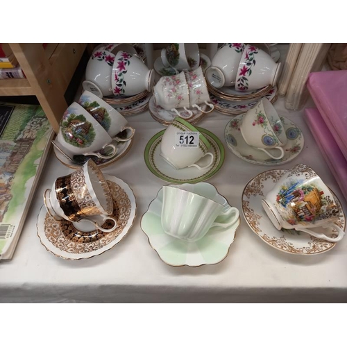 512 - A selection of china cups and saucers.