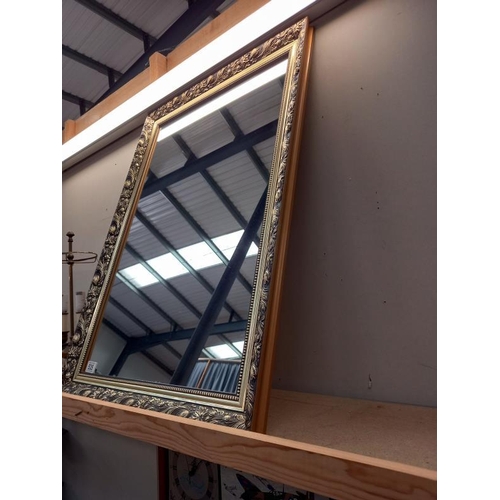 535 - A gilt framed mirror. 61cm x 86cm.
Collect Only.