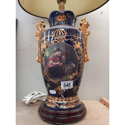 548 - A hand painted classical style table lamp with shade. Collect Only.