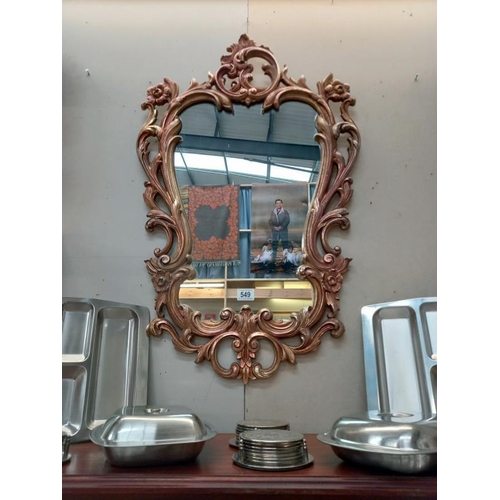 549 - A gilt ormolu framed mirror 57cm x 91cm.
Collect Only.