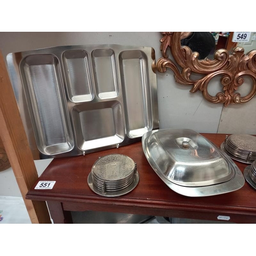 550 - A quantity of stainless steel serving dishes.