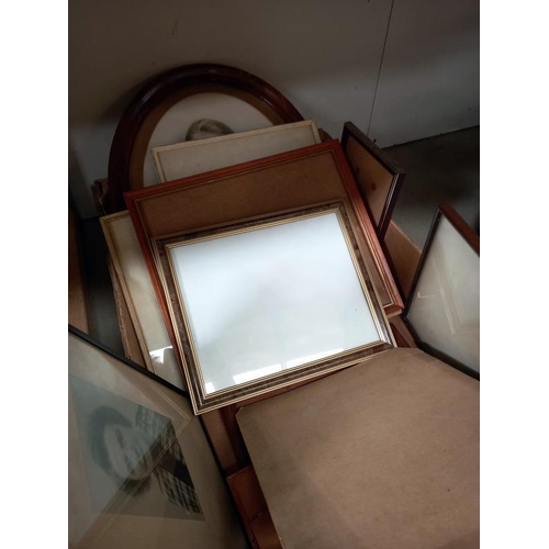 553 - A quantity of frames containing old family photographs.