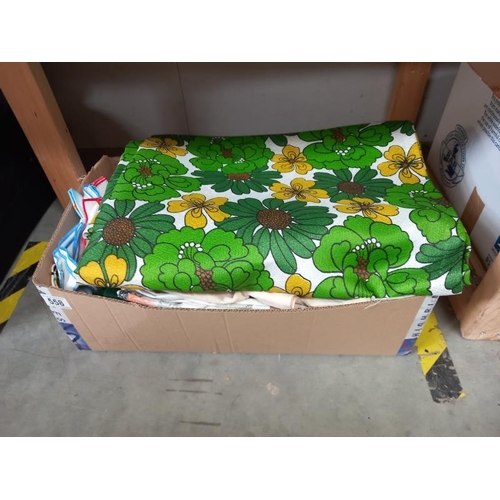 558 - A suitcase and box of vintage linen including 1970's green floral pattern.