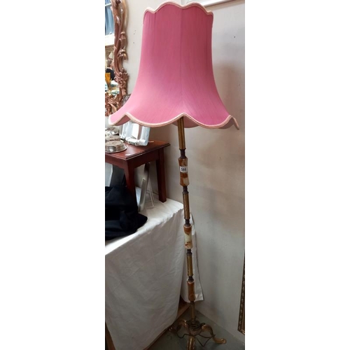 566 - A vintage onyx and brass floor standing standard lamp. Collect Only.