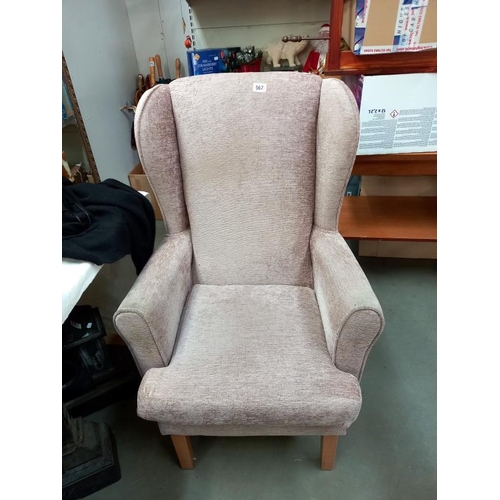 567 - A light brown draylon wing armchair. Collect Only.