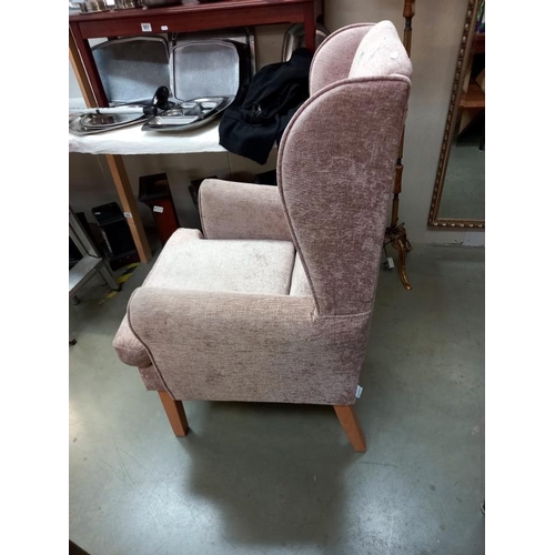 567 - A light brown draylon wing armchair. Collect Only.