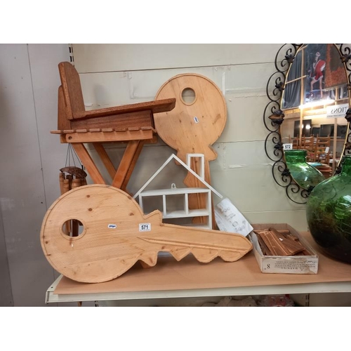 571 - A quantity of wooden items including 2 large Yale key cut outs, folding stool etc.