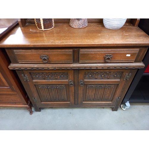 579 - An oak dresser. 2 drawers, 93 cm x 44cm height 82cm. Collect Only.