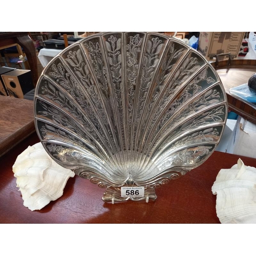 586 - A large silver plated scallop shell dish 28cm x 26cm and 2 clam shells.