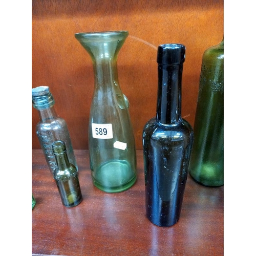 589 - A selection of old bottles.