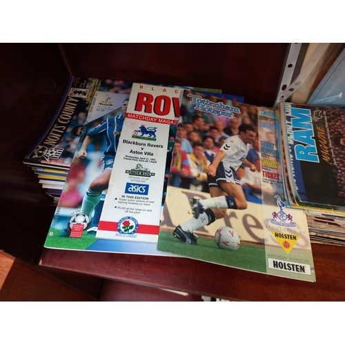 604 - A large quantity of football programmes including Tottenham Hotspurs, Aston Villa and Bradford City ... 