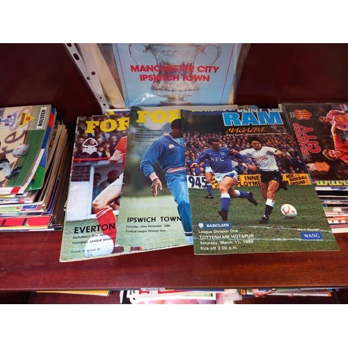 604 - A large quantity of football programmes including Tottenham Hotspurs, Aston Villa and Bradford City ... 