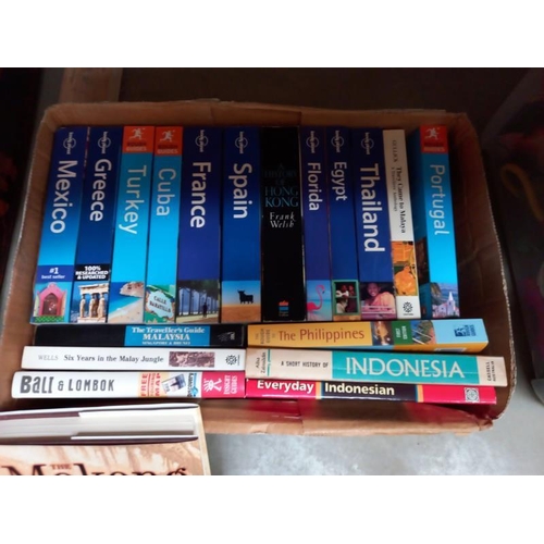 607 - A box of tourist books.