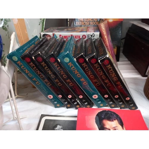 622 - A quantity of Kung Fu DVD's season 1&2, Bruce Lee and books and videos etc.