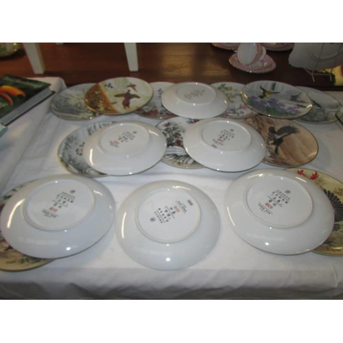 741 - 17 Japanese bird decorated collector's plates.