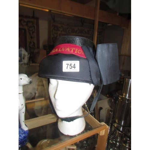 754 - A ladies Salvation Army bonnet, (head not included).