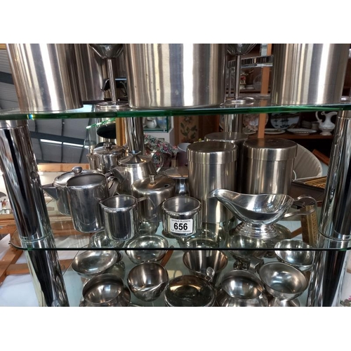 656 - A large quantity of stainless steel kitchen/table ware. Collect only