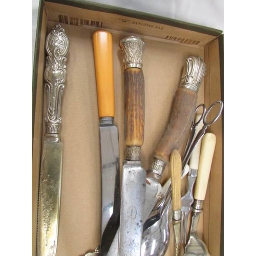 770 - A selection of antique carving knives and other cutlery.