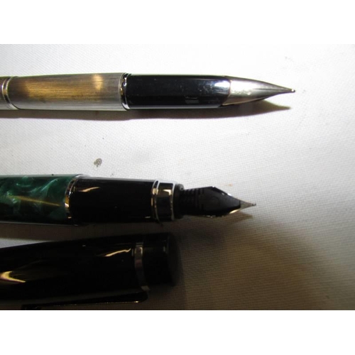 779 - A quantity of pens including fountain pens.,