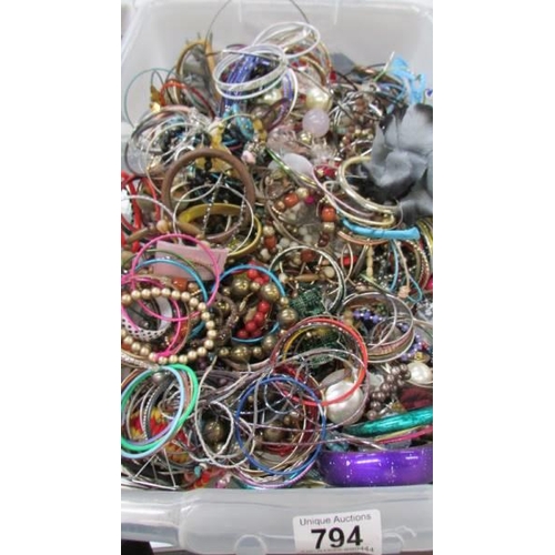 794 - A large lot of assorted costume bracelets.