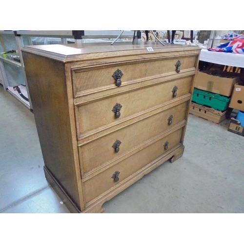 812 - An oak four drawer chest in good condition, COLLECT ONLY.