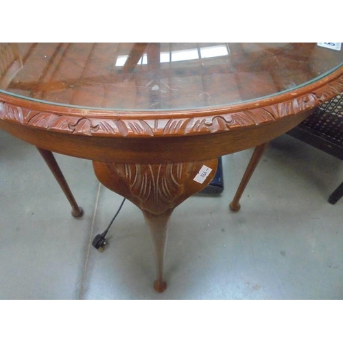 819 - A walnut D shaped hall table. COLLECT ONLY.