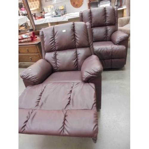 825 - Two reclining arm chairs. COLLECT ONLY.