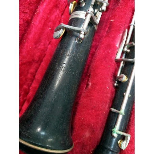 745 - A cased oboe, (No mouth piece) a music stand and two new microphones.