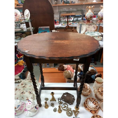 735 - A barley twist leg oval occasional table. COLLECT ONLY.