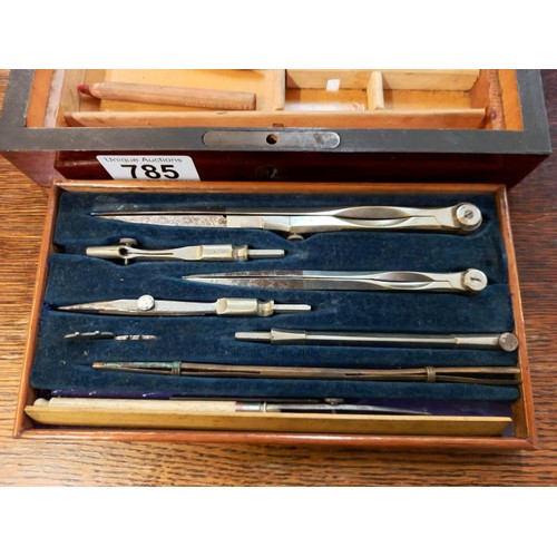 785 - An Edwardian mahogany cased geometry set.