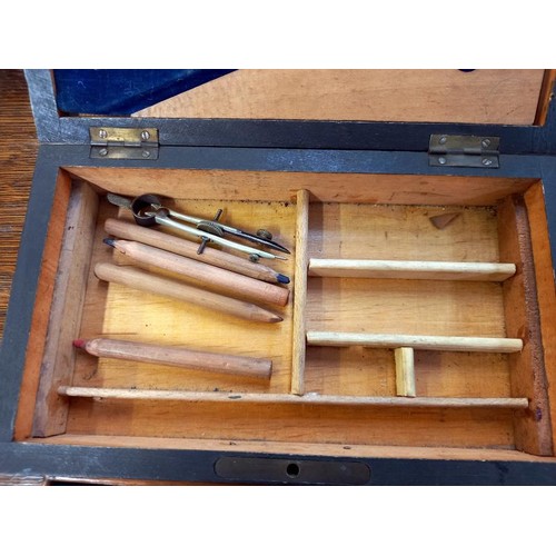 785 - An Edwardian mahogany cased geometry set.