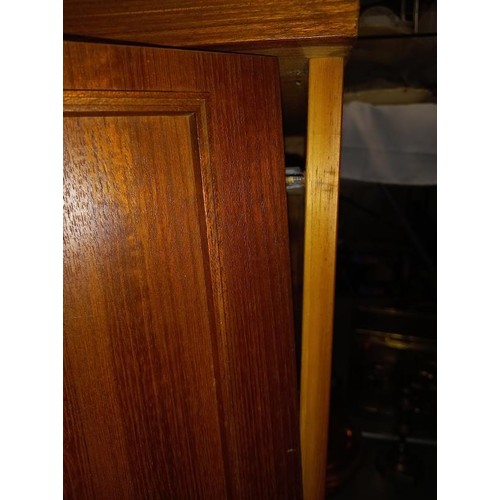 704 - A good teak sideboard. Approximately (84