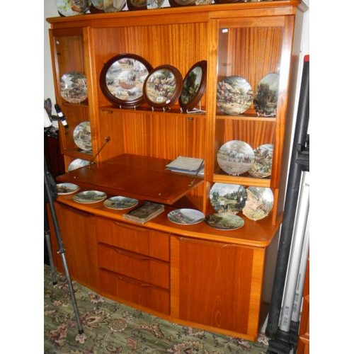 502 - A good quality teak display cabinet.