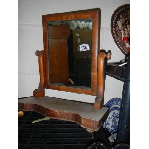 535 - An early 20th century mahogany toilet mirror.