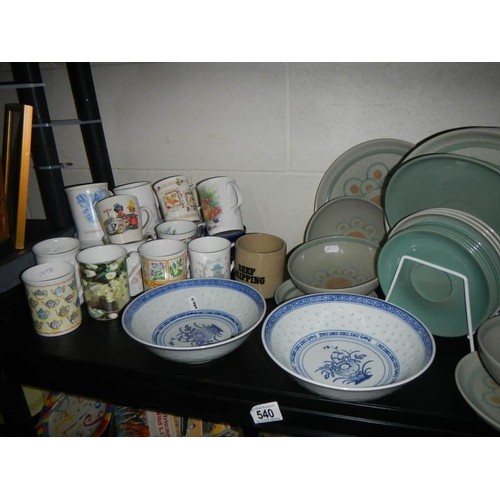 540 - A mixed lot of ceramic plates, cups etc.,