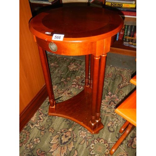 566 - A good quality mahogany six leg circular table.