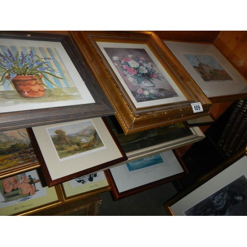 609 - Four shelves of assorted prints etc.,