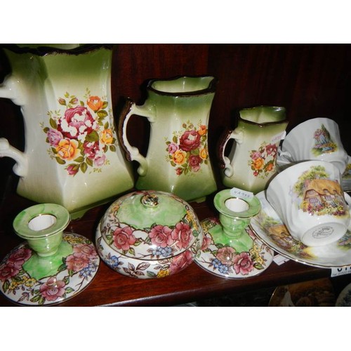 617 - A mixed lot of ceramics including set of three graduated jugs.