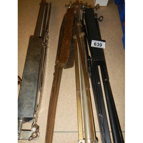 639 - Three old music stands.