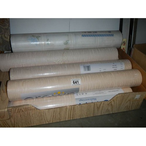 641 - A quantity of new rolls of wall paper.