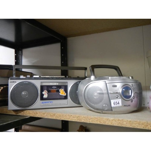 654 - A Sony radio and a Philips radio.