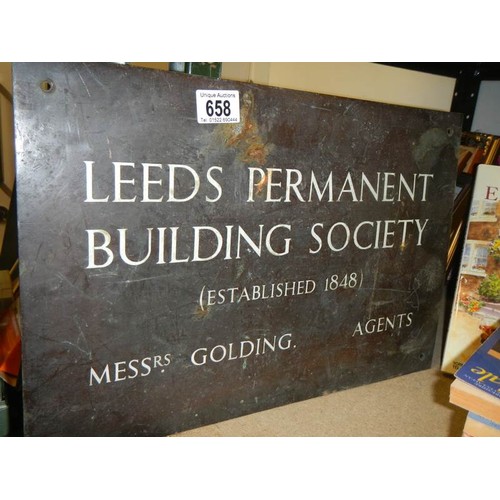 658 - A solid brass Leeds Permanent sign.