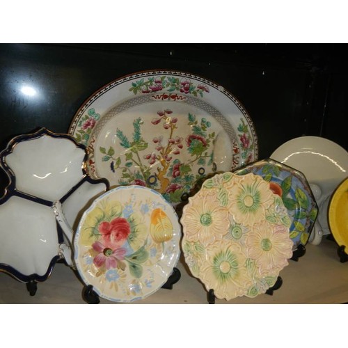 680 - A mixed lot of interesting ceramic plates.