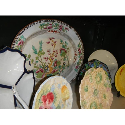 680 - A mixed lot of interesting ceramic plates.