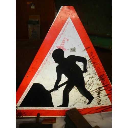 336 - An old road sign.