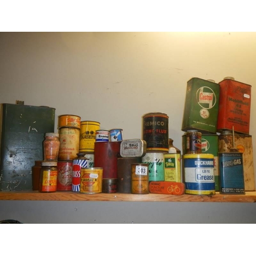 303 - A collection of metal tins.