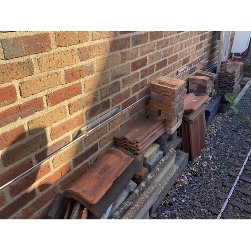 180 - A selection of bricks, tiles, ridges, slates etc. Collect Only.