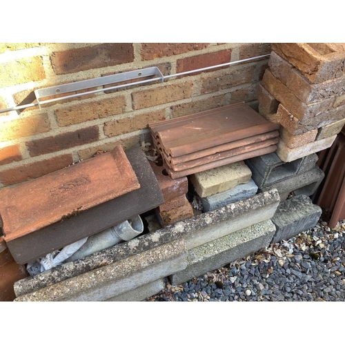 180 - A selection of bricks, tiles, ridges, slates etc. Collect Only.