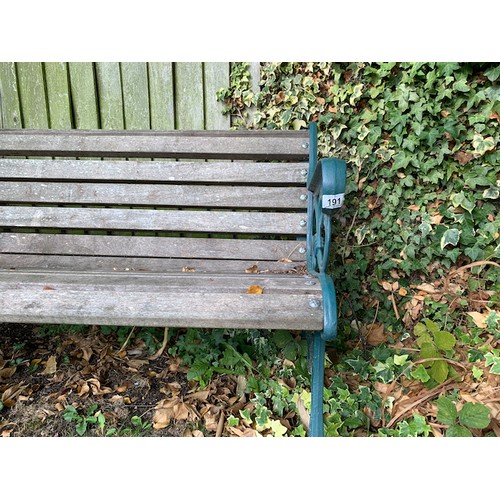 191 - A garden bench, hardwood slats, cast iron ends. Good condition 56 inch long. Collect Only.