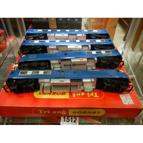 1512 - A Triang Hornby H0/00 boxed R.555 diesel Pullman motor car, type 2 blue livery, R.556 and two coache... 